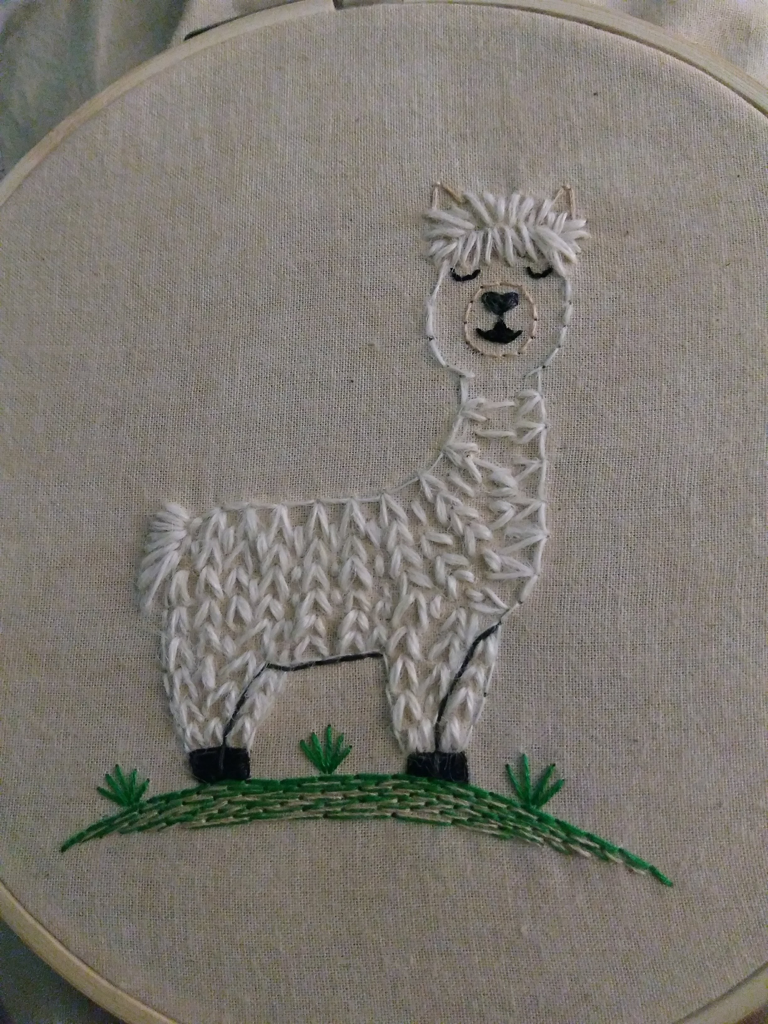 Needlework of an alpaca