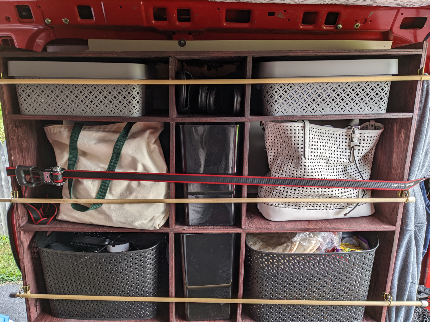 View of cabinet with cargo net off